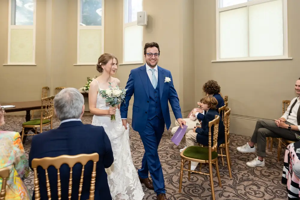 Bride and groom leaving ceremony. Reading Town Hall Wedding photographer