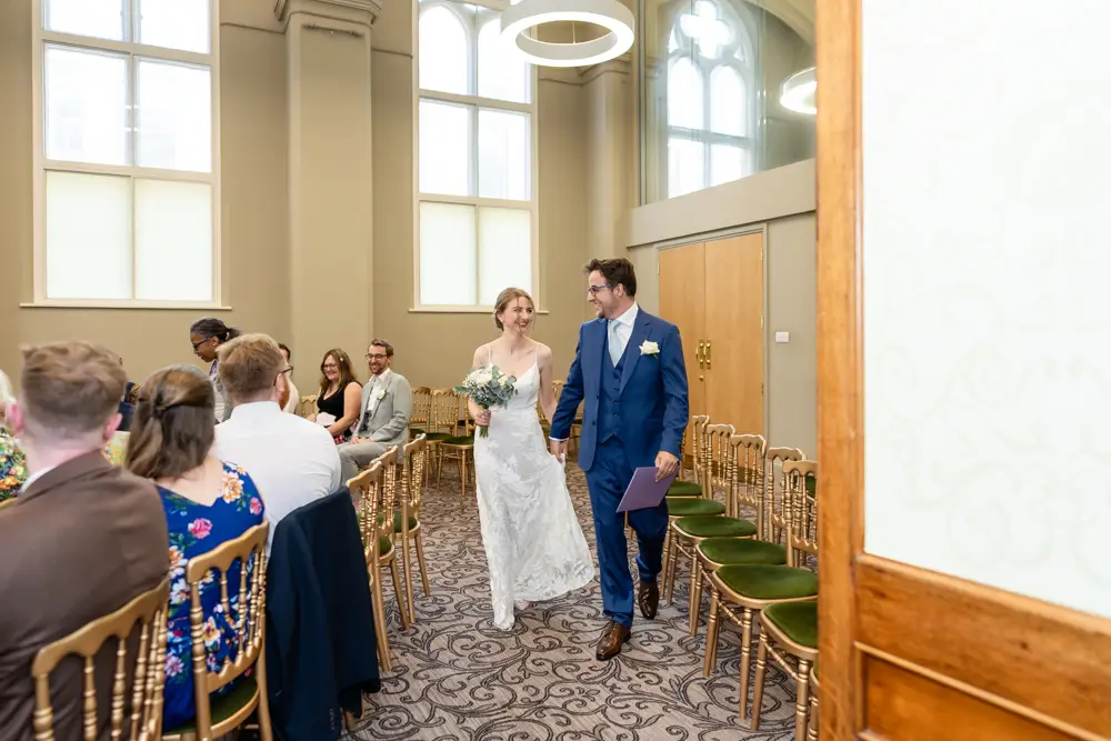 Bride and groom leaving ceremony. Reading Town Hall Wedding photographer