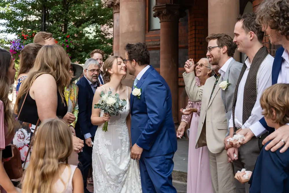 Bride and groom in confetti. Reading Town Hall Wedding photographer