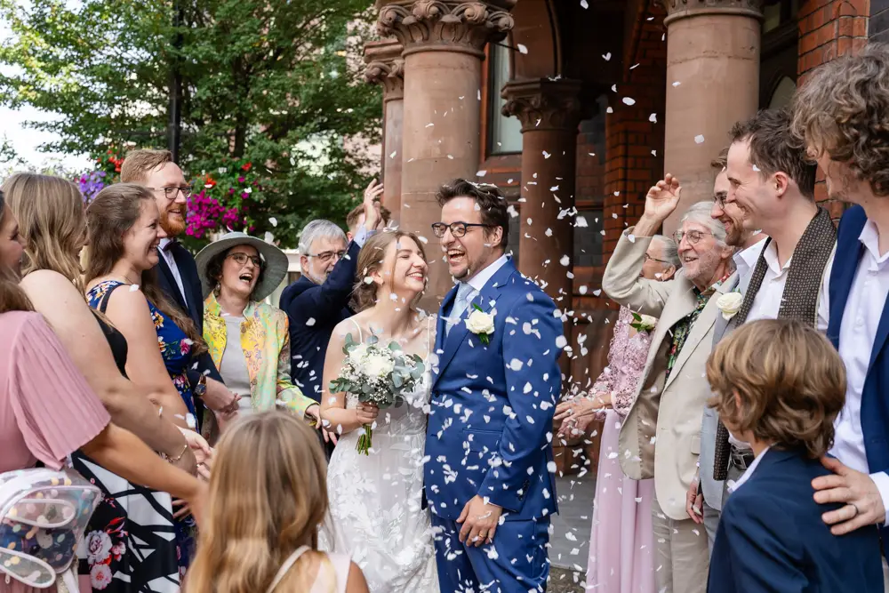 Bride and groom in confetti. Reading Town Hall Wedding photographer