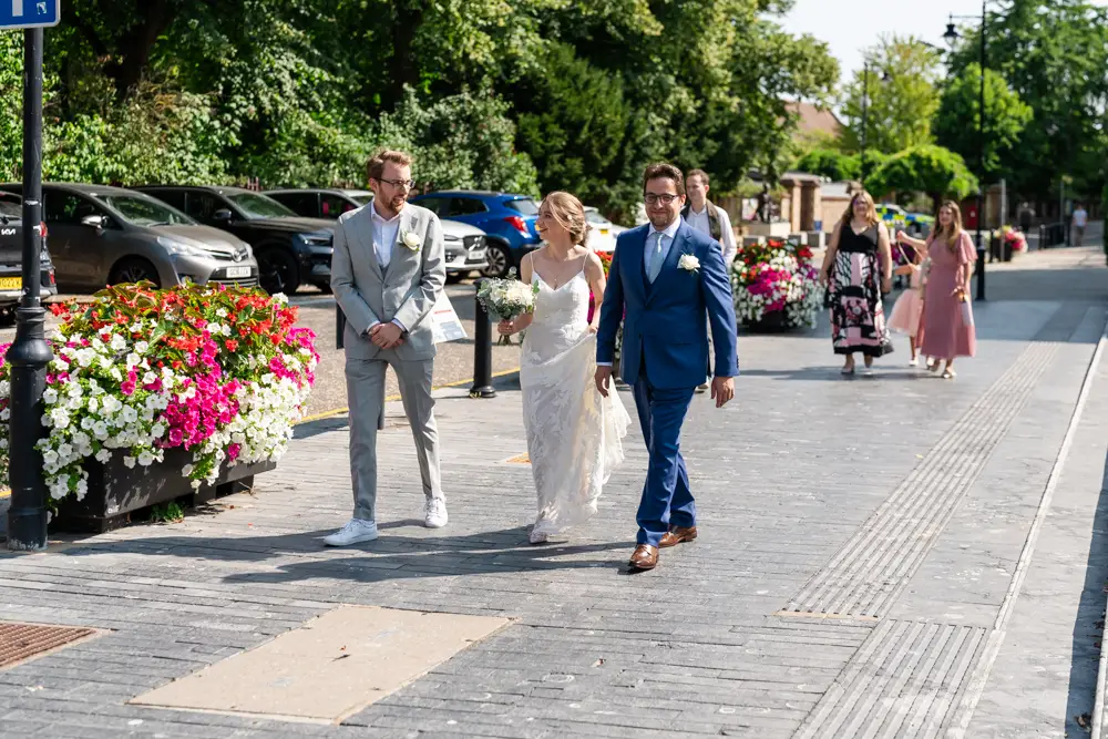 Bride and groom procession to Town Hall Reading. Wedding photographer