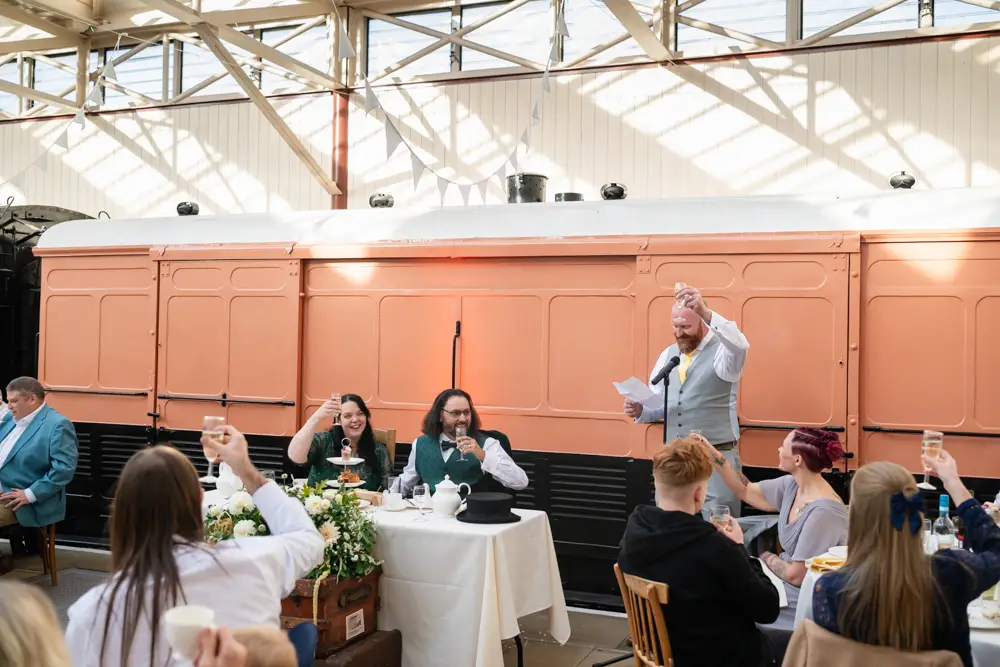 Buckinghamshire Railway Centre Wedding Photographer. best man speech in main hall.