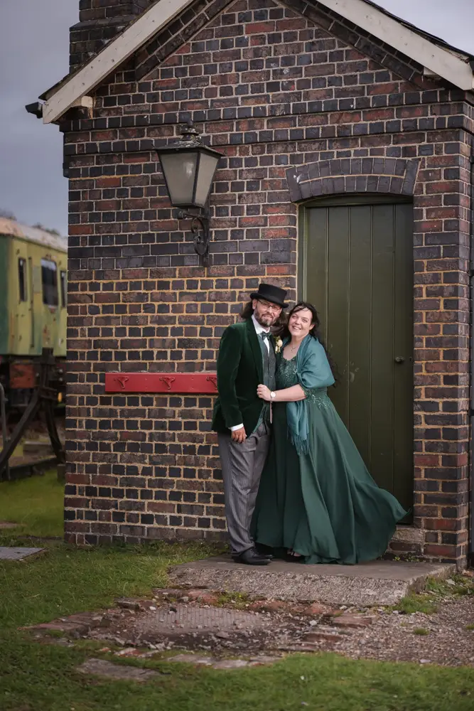 Buckinghamshire Railway Centre Wedding Photographer. Bride and groom at sunset .