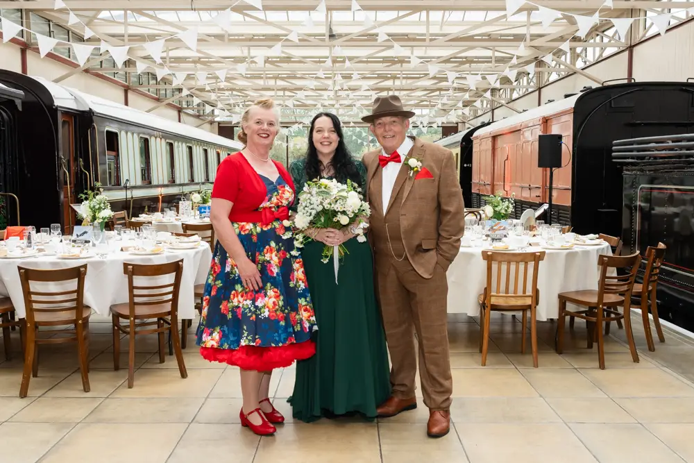 Buckinghamshire Railway Centre Wedding Photographer. bride and guest in main hall.