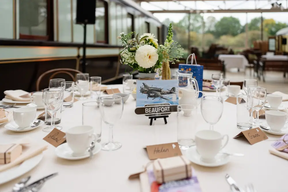 Buckinghamshire Railway Centre Wedding Photographer. Table details in main hall.