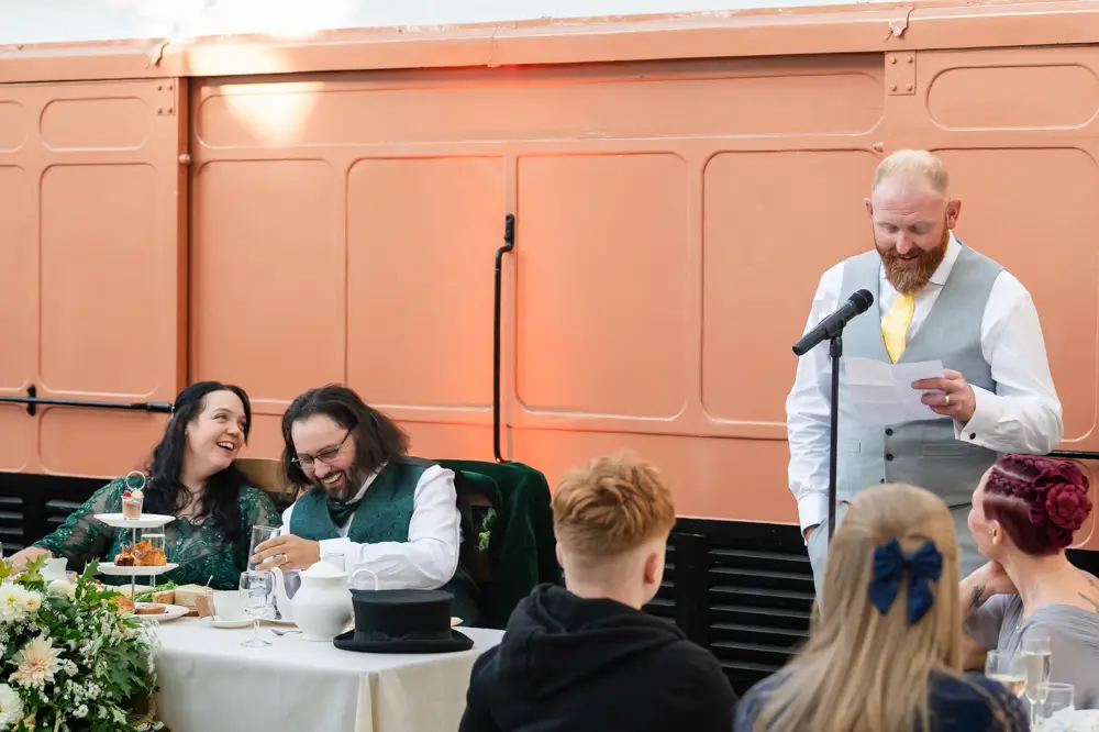 Buckinghamshire Railway Centre Wedding Photographer. best man speech in main hall.