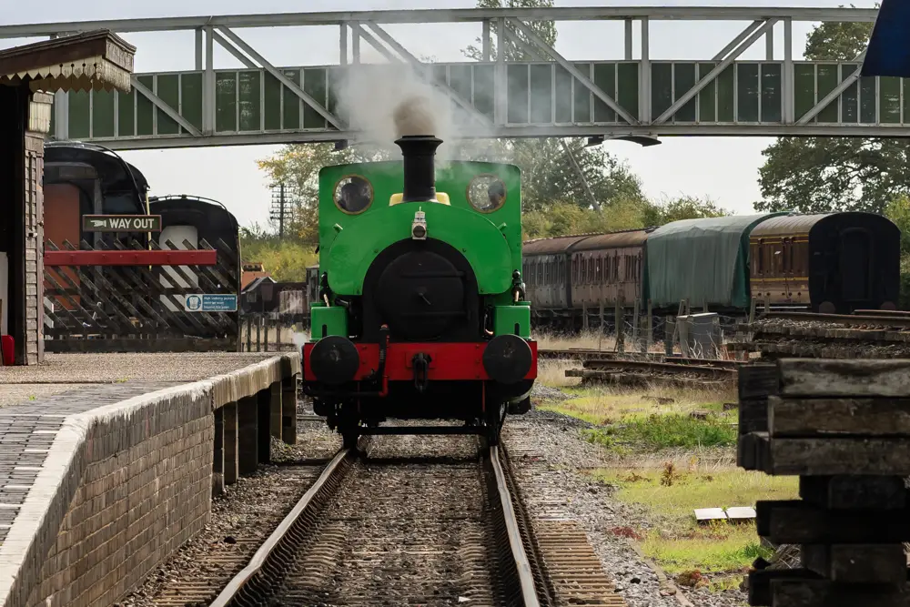 Bucks Railway Centre. Green steam train approaching station