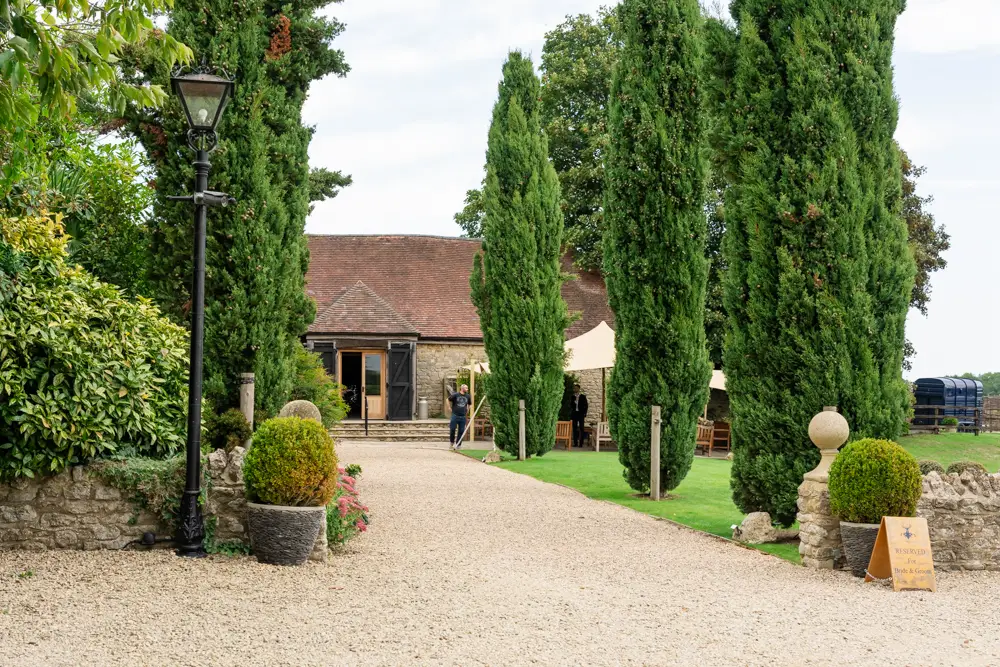 Notley Tythe Barn Wedding Photography. Front elevation of the barn