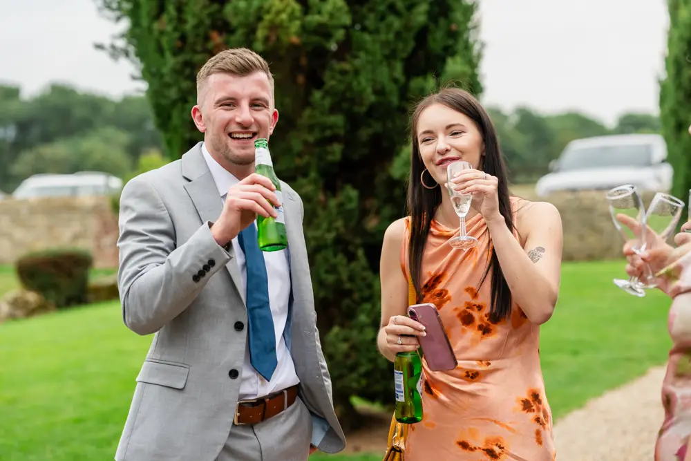 Notley Tythe Barn Wedding Photography. Wedding guests