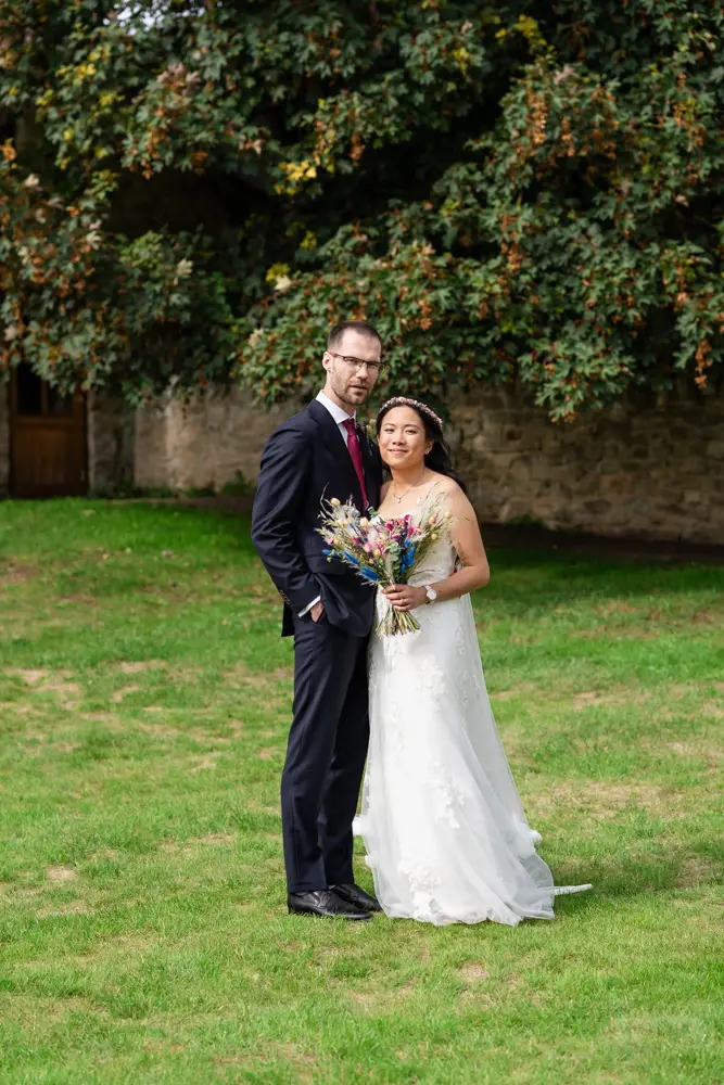 Notley Tythe Barn Wedding Photography. bride and groom portrait