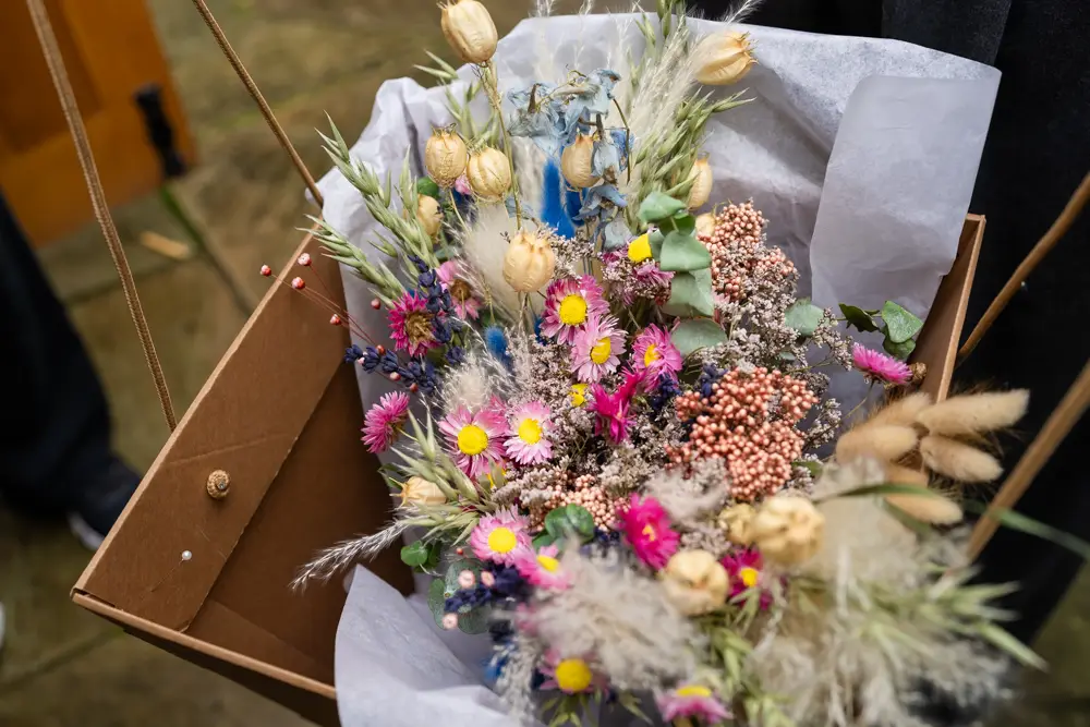 Notley Tythe Barn Wedding Photography. bridal bouquet of dried flowers