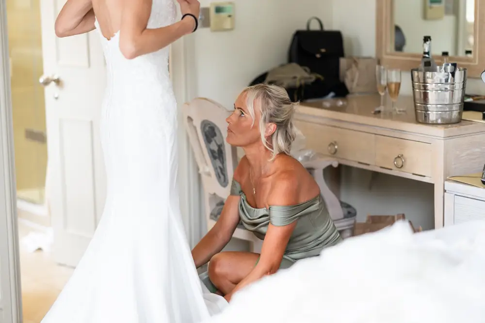Stoke Place wedding photographer. Bride getting ready in Alexandra suite.