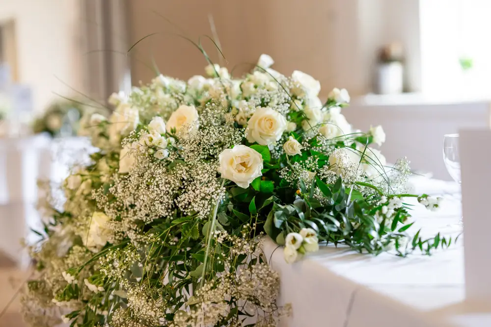 Stoke Place wedding photographer. Table flowers