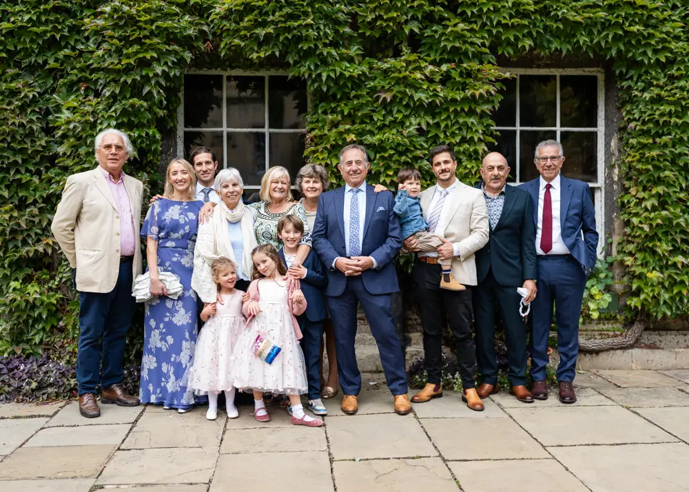 Lincoln College Oxford wedding photographer. Family group outside the senior common room on the front quad of the college.