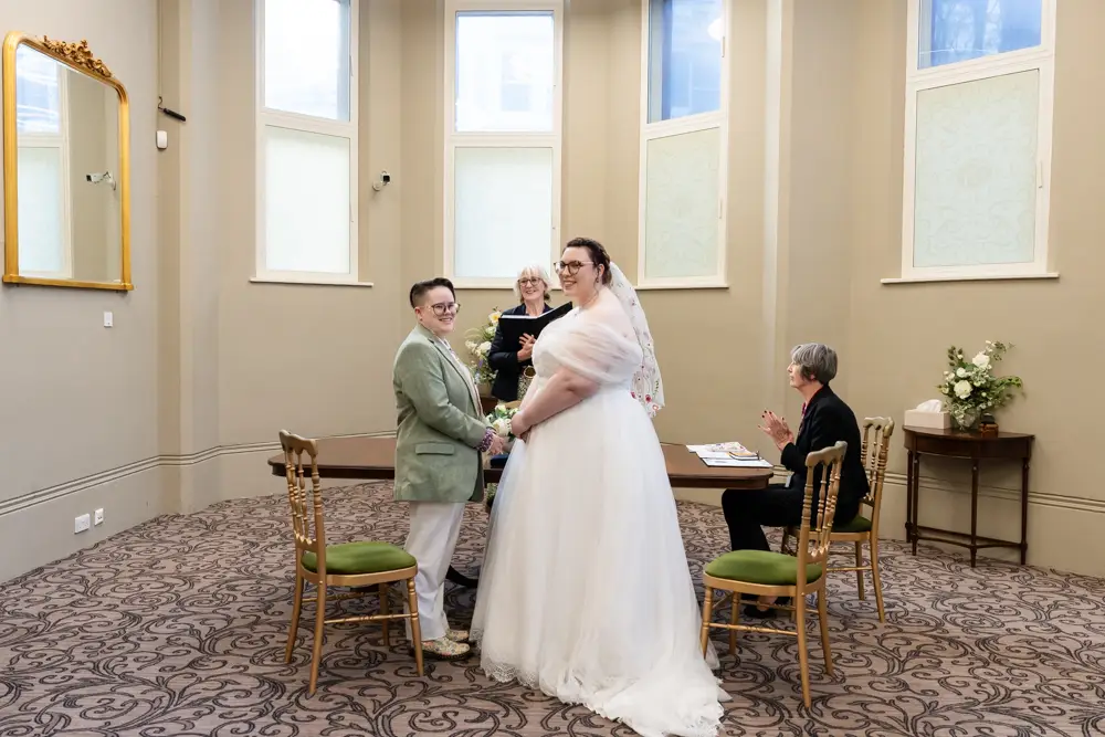 Reading Town Hall wedding photographer. Lesbian couple during ceremony at the town hall.