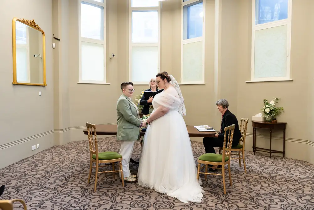 Reading Town Hall wedding photographer. Lesbian couple during ceremony at the town hall.