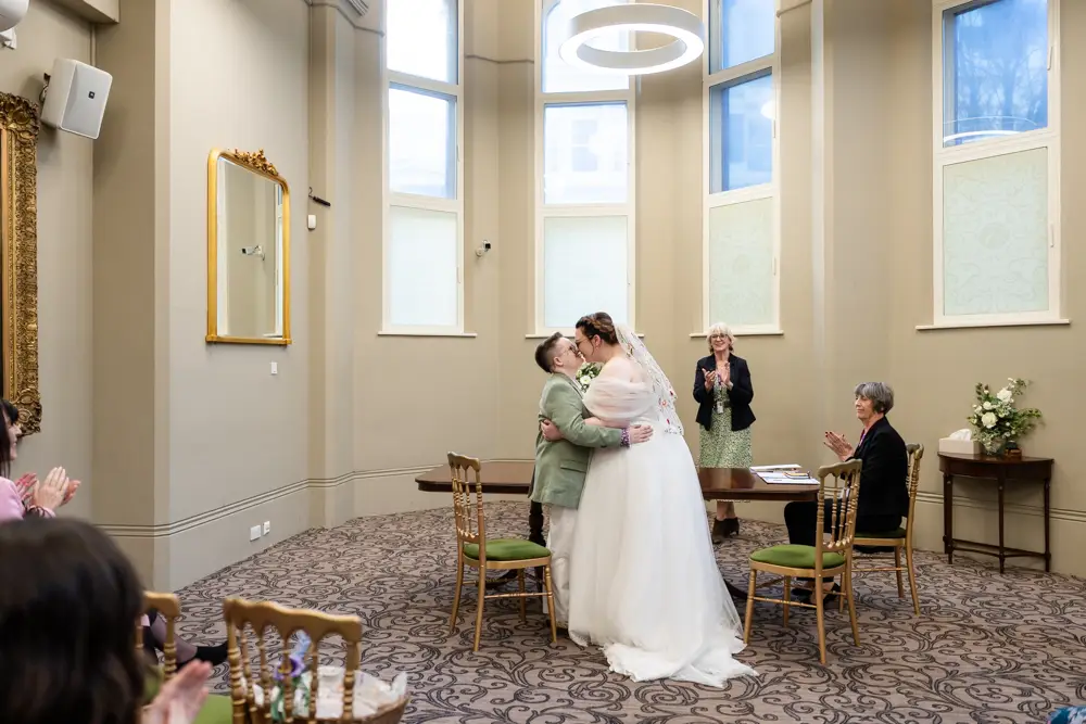 Reading Town Hall wedding photographer. Newlyweds first kiss after ceremony at the town hall.