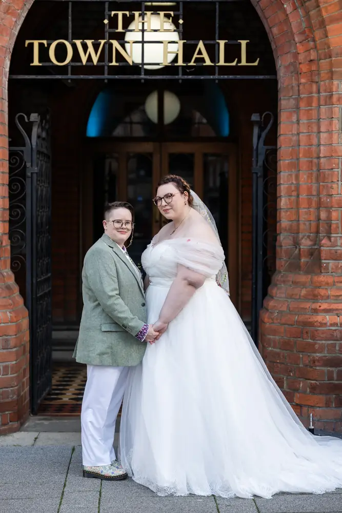Reading Town Hall wedding photographer. Newlyweds outside the old town hall entrance.