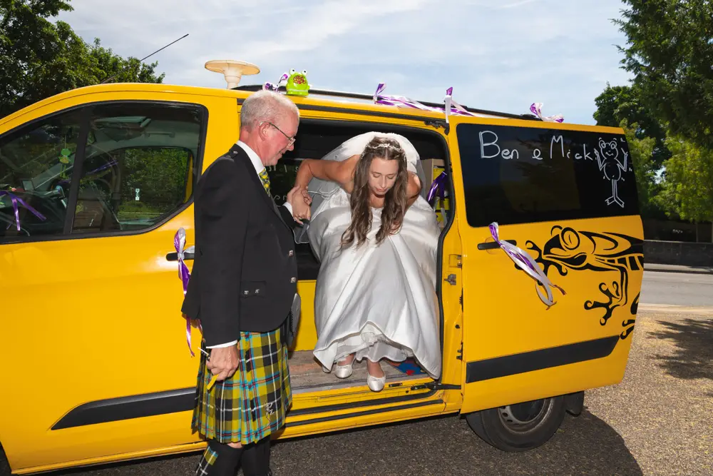 Oxfordshire Wedding Photographer. Bride arriving for ceremony at Our Lady and St Edmund's church in Abingdon.
