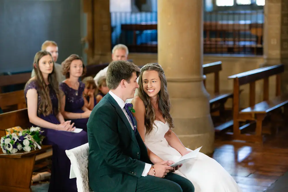 Oxfordshire Wedding Photographer. Bride and groom during ceremony at Our Lady and St Edmund's church in Abingdon.