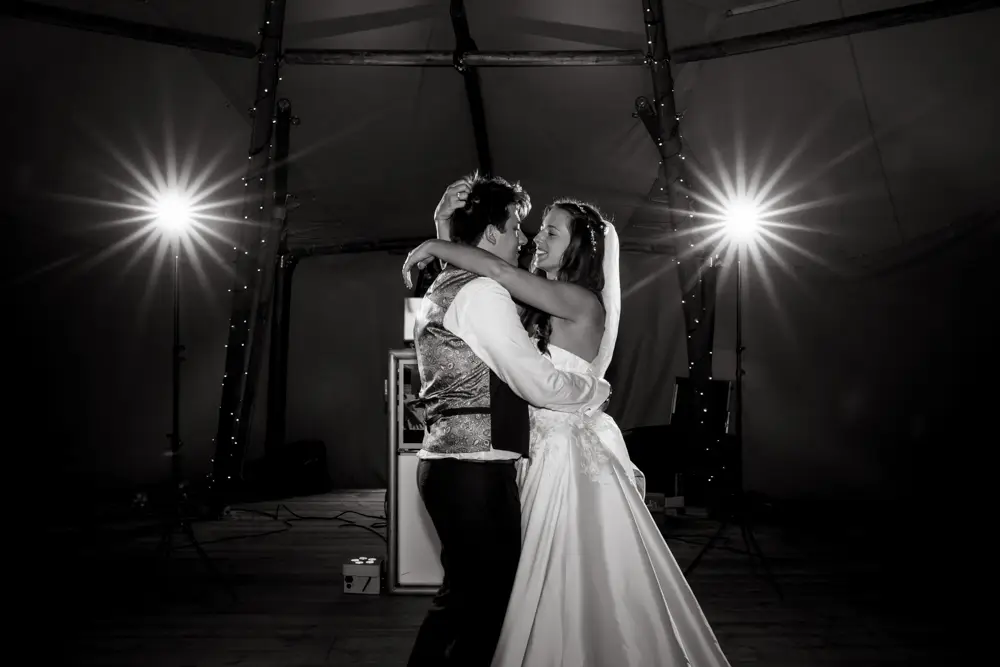 Oxfordshire Wedding Photographer. Bride and groom first dance at Dovecote Events.