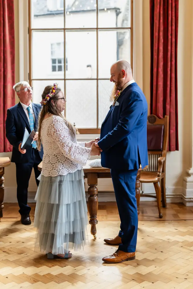 Bride and groom at the end of ceremony at Woodstock Town Hall in Oxfordshire
