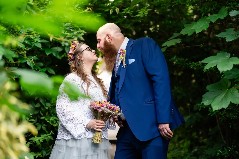 Woodstock wedding photographer. Bride and groom in the village after their wedding ceremony at Woodstock Town Hall in Oxfordshire.