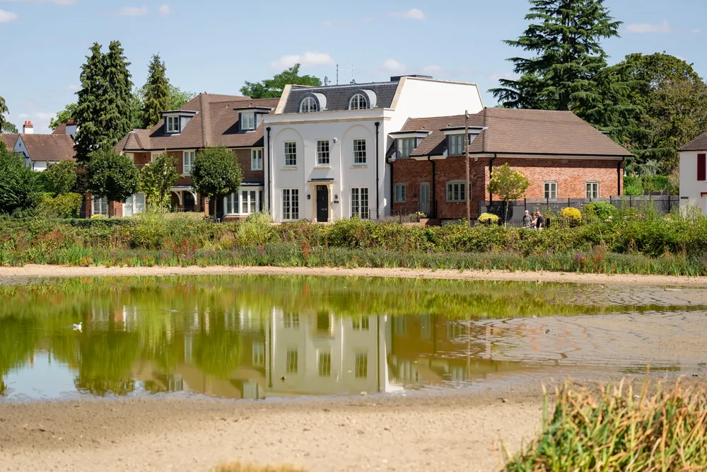 Latchmoor pond in August 2026 on a wedding morning at the Bull Hotel.
