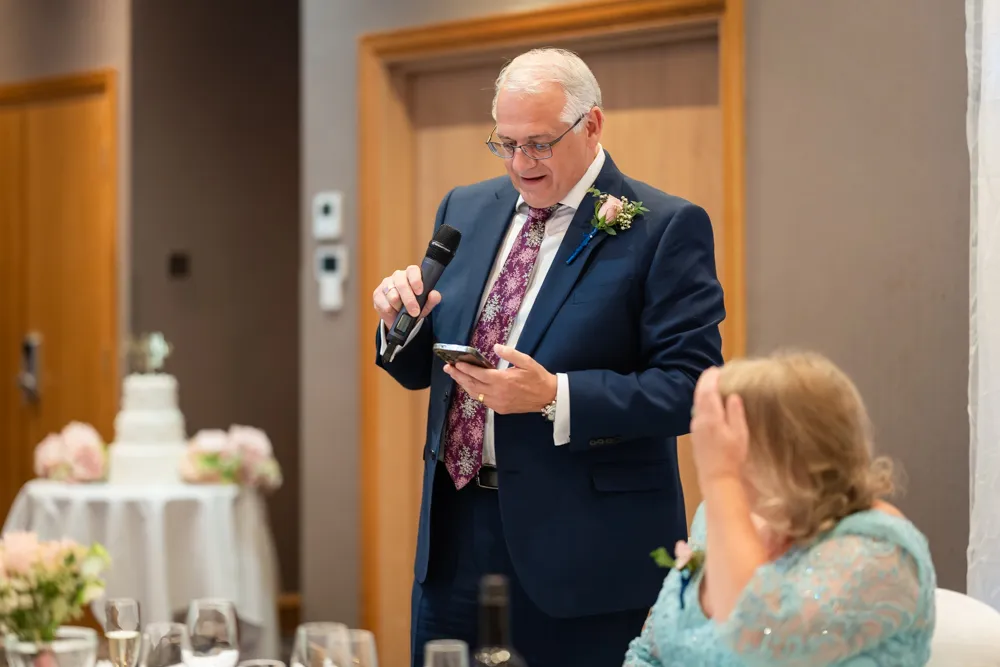 Father of the bride speech in the Thames Suite. Bull Hotel Wedding Photographer.