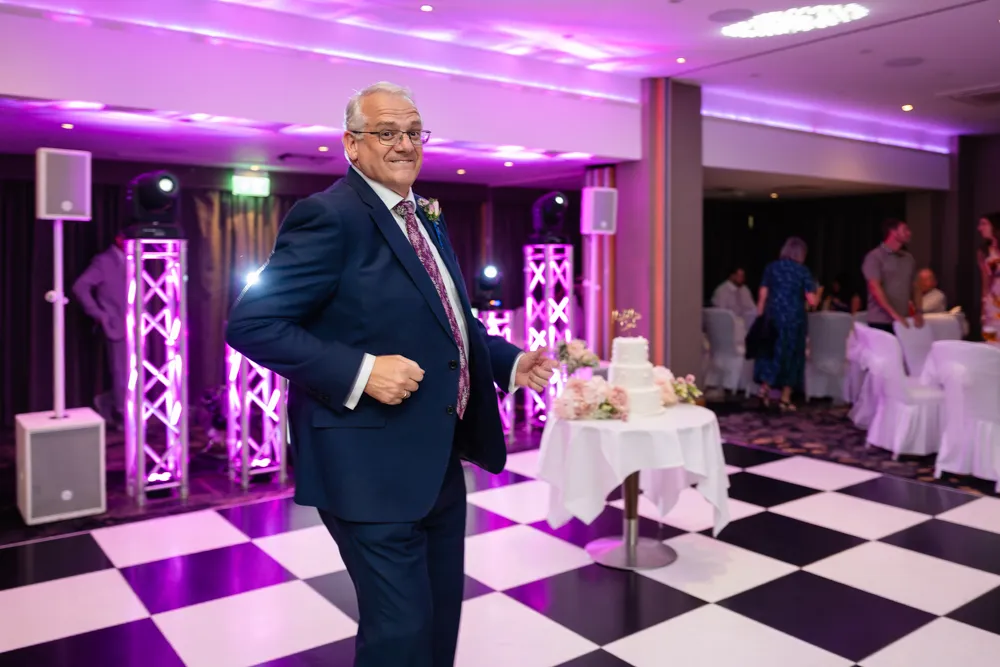 Father of bride giving his best dance walk. Bull Hotel Wedding Photographer.