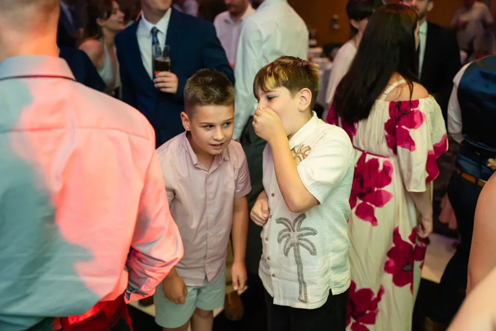Guests dancing in Thames Suite. Bull Hotel Wedding Photographer.