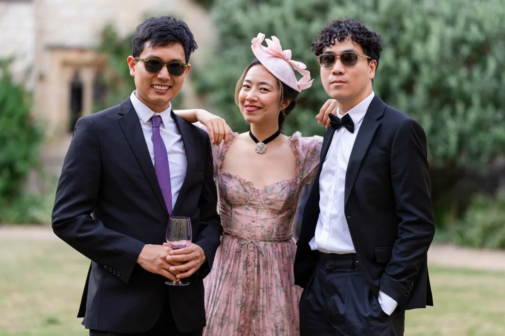 St Cross College wedding photographer. Guest photos in the Blackwell Quad.